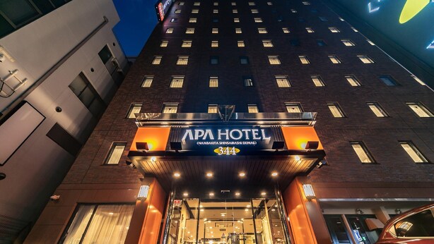 A hotel entrance with a sign reading 'APA HOTEL' and the address '344'. - Nishitetsu Inn Shinsaibashi (Osaka)
