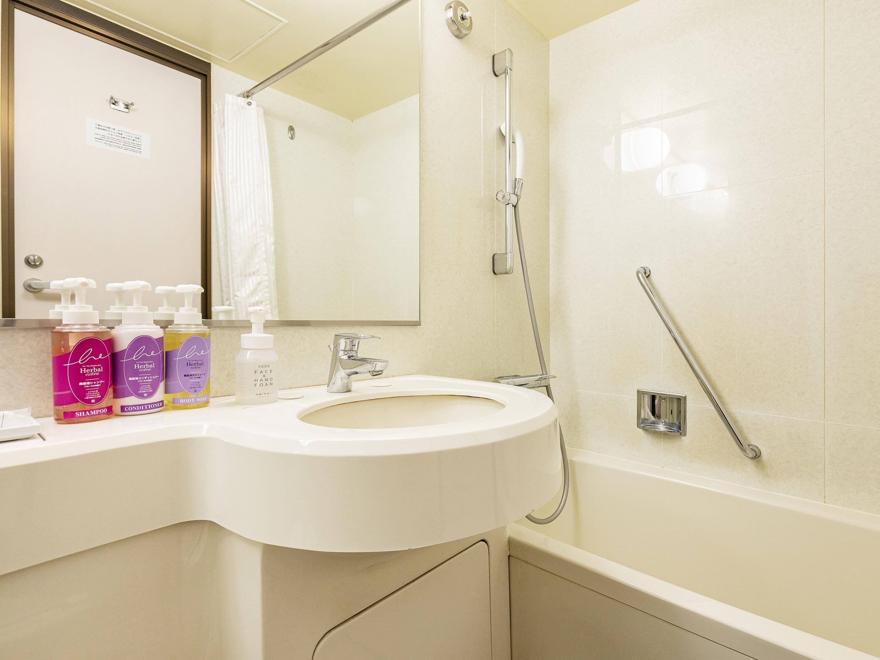 combined shower/bathtub, free toiletries, hair dryer, bathrobes