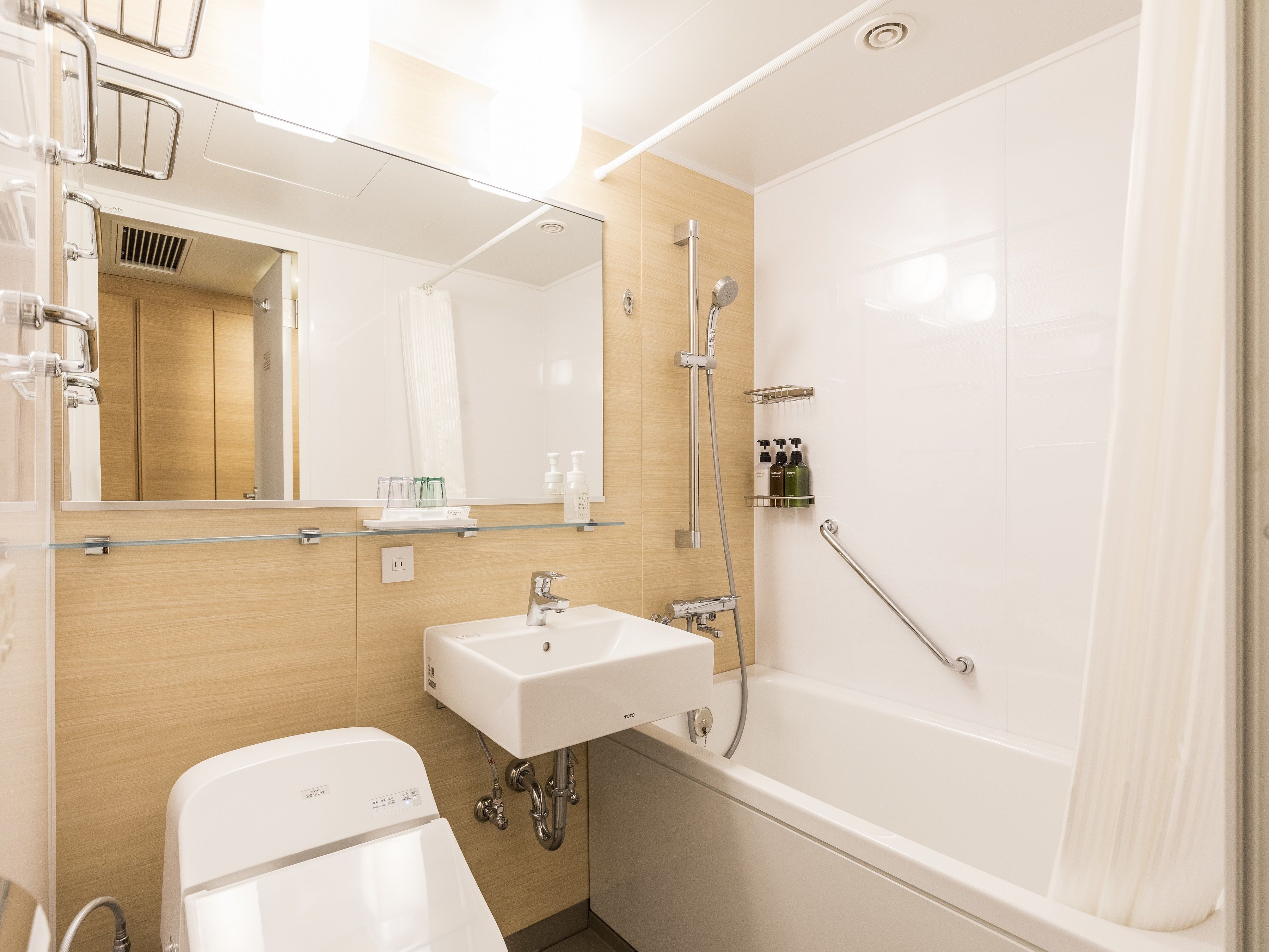 combined shower/bathtub, free toiletries, hair dryer, bathrobes