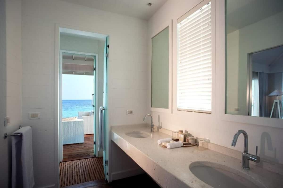 two bedroom water villa with private pool | bathroom | combined shower/bathtub, free toiletries, hair dryer, towels