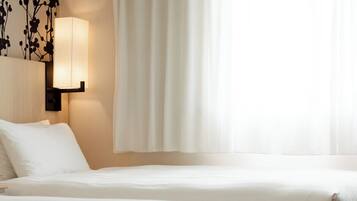 Habitación estándar con 2 camas individuales, no fumadores | Tabla de planchar con plancha y wifi gratis
