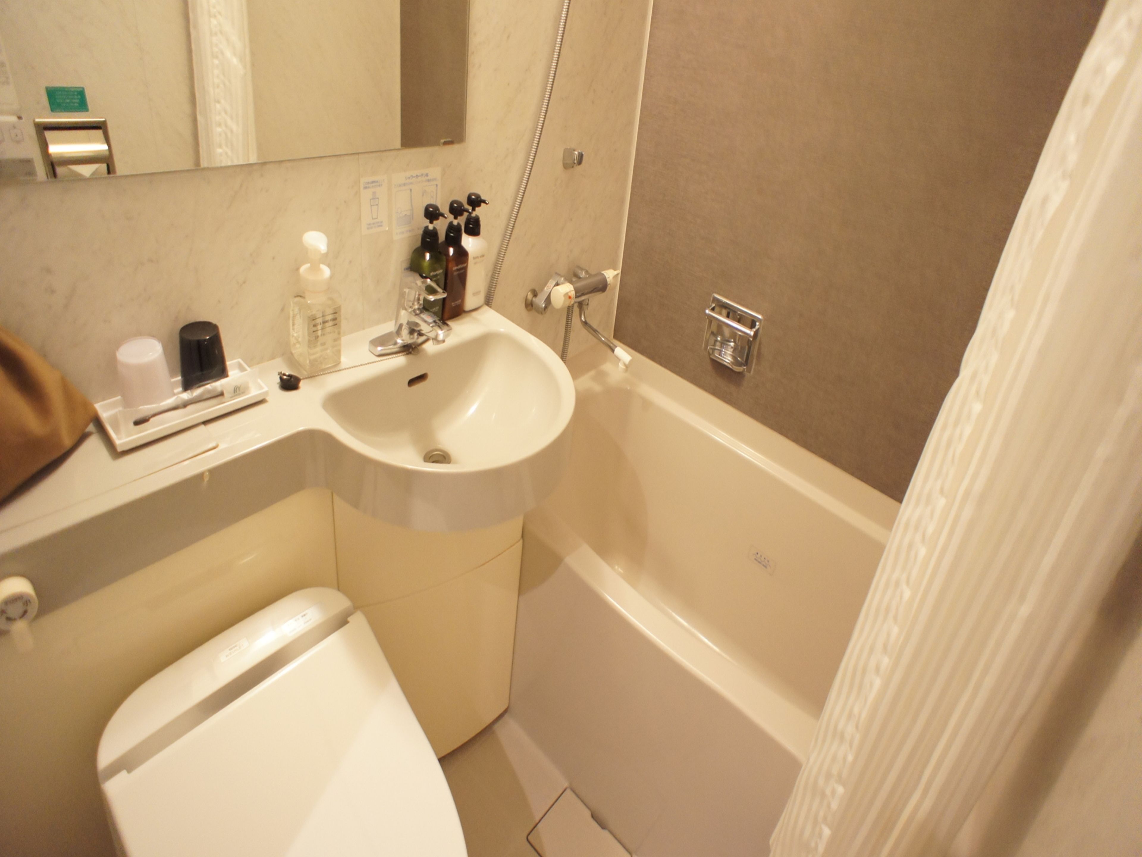 combined shower/bathtub, free toiletries, hair dryer, bathrobes