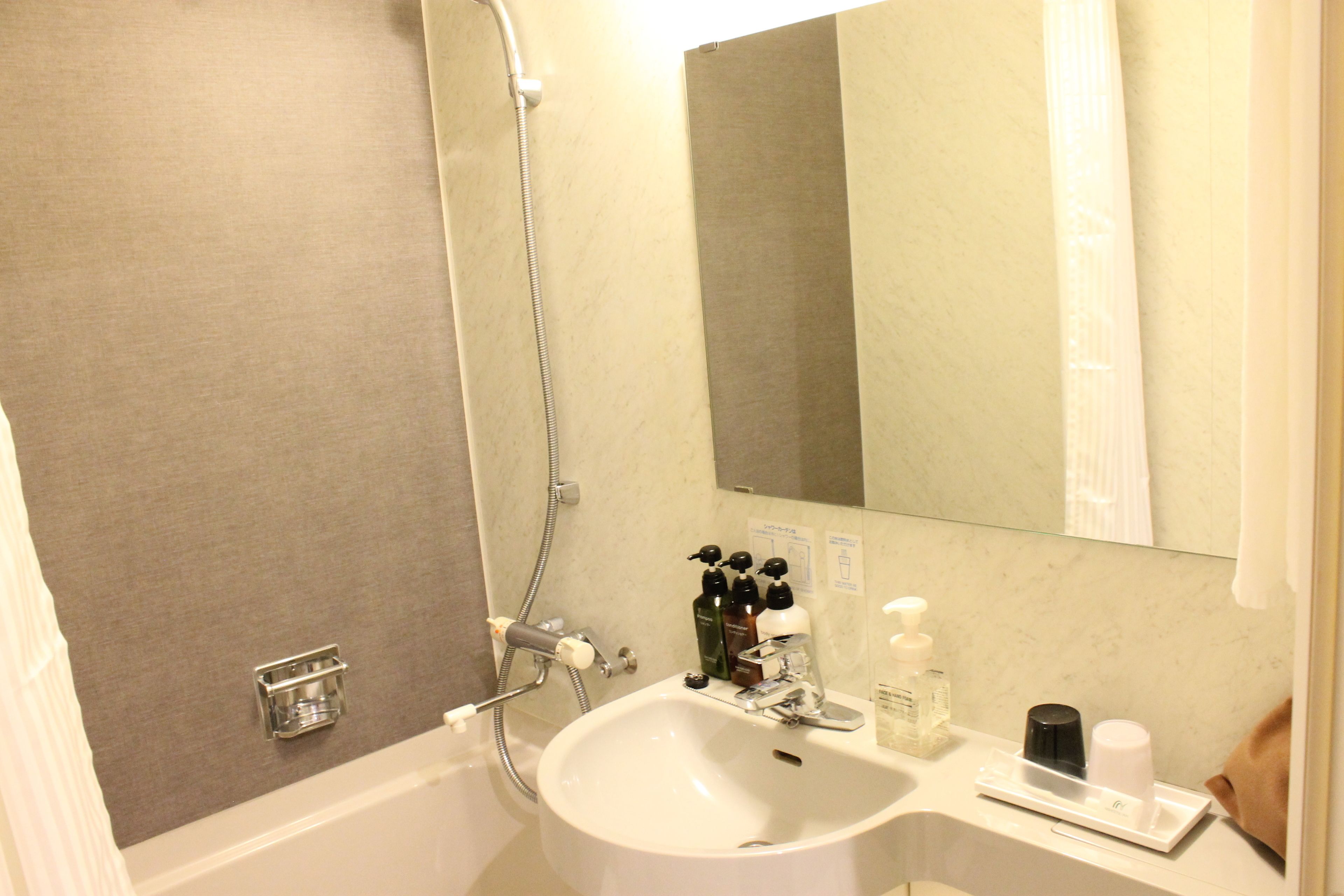 combined shower/bathtub, free toiletries, hair dryer, bathrobes