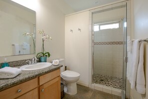 Plumeria Suite | Bathroom | Free toiletries, hair dryer, bathrobes, towels - Kaiholo Hale (Paia)