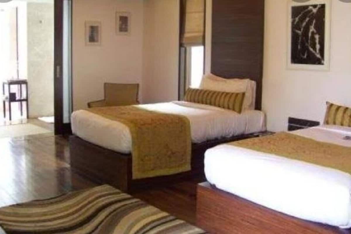 estate pool villa twin bed | premium bedding, minibar, in-room safe, desk