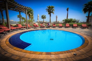 Outdoor pool, pool umbrellas, pool loungers