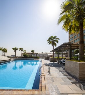 Outdoor pool, pool umbrellas, pool loungers