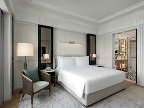 Luxe beddengoed, pillowtop-bedden, een minibar met enkele gratis items