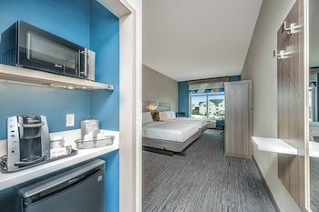 Standard Room, 2 Queen Beds | Desk, laptop workspace, blackout drapes, iron/ironing board at Holiday Inn Express & Suites Charleston Arpt-Conv Ctr Area