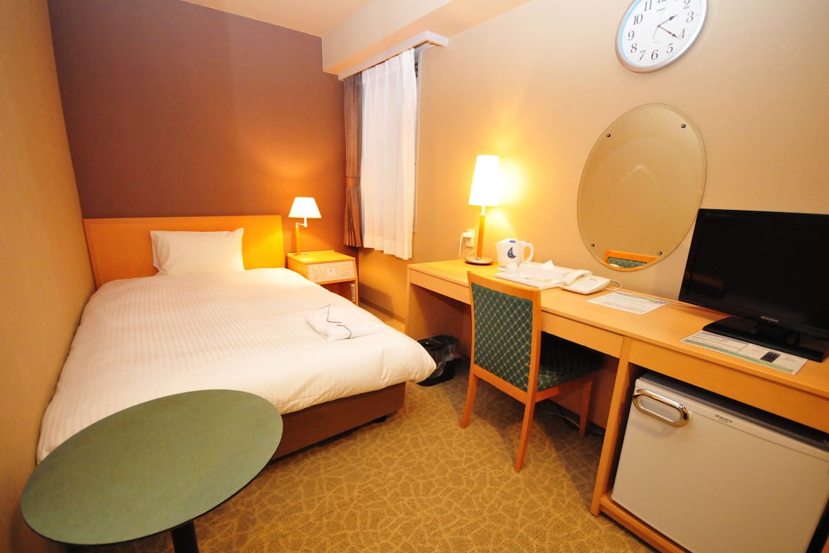 Down duvets, blackout curtains, iron/ironing board, free WiFi