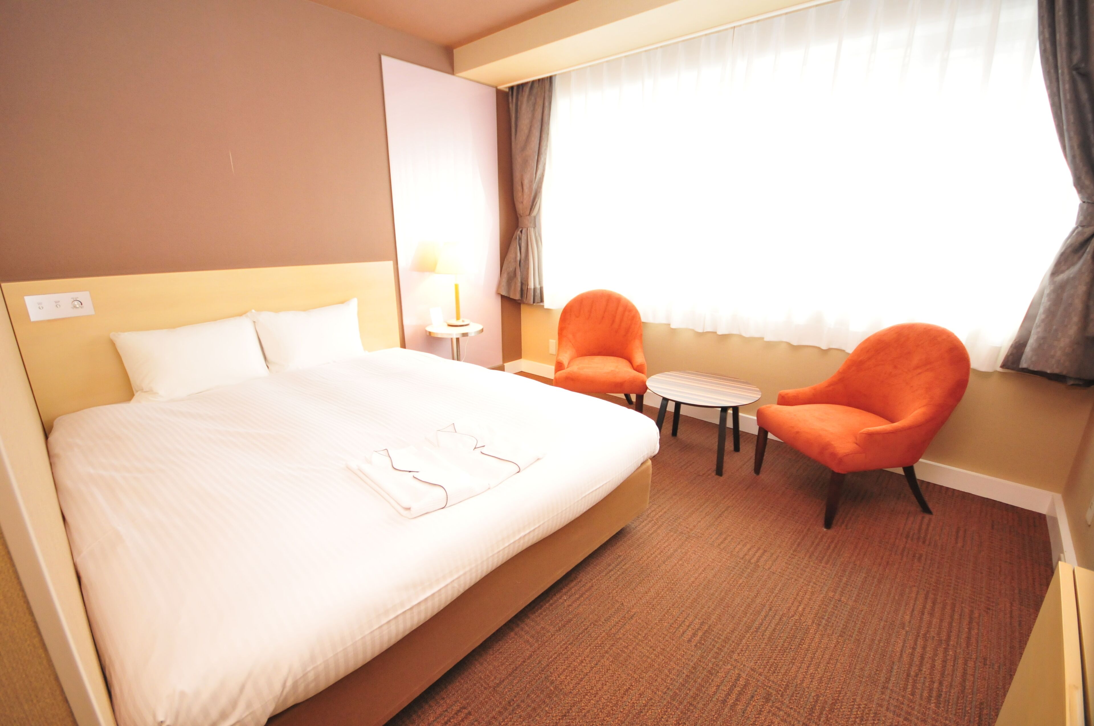 Down duvets, blackout curtains, iron/ironing board, free WiFi