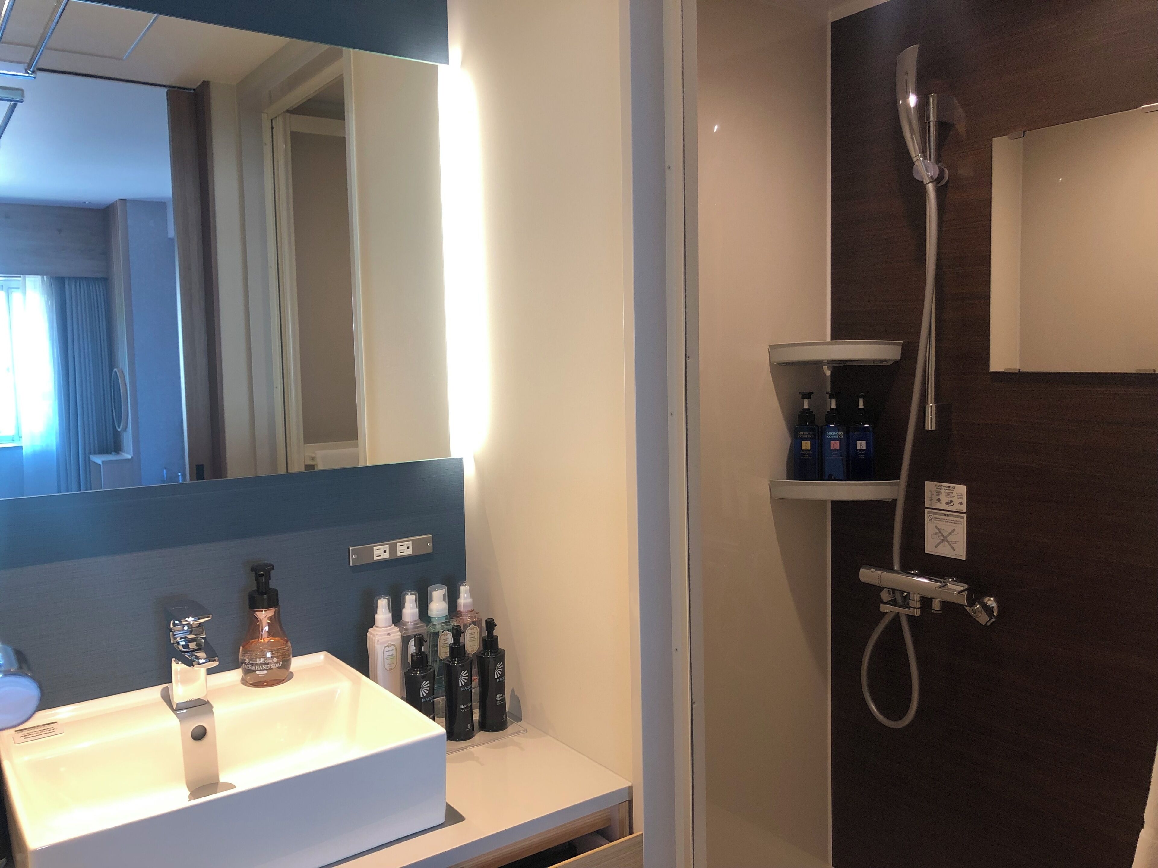 superior twin room | bathroom | shower, rainfall showerhead, free toiletries, hair dryer