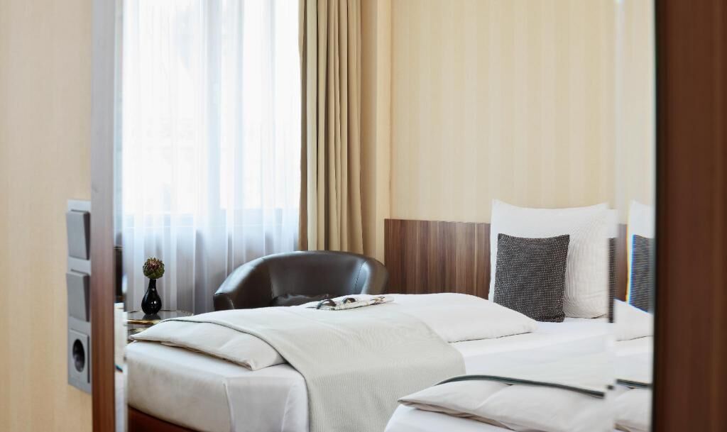 Luxe beddengoed, een kluis op de kamer, een bureau, gratis wifi