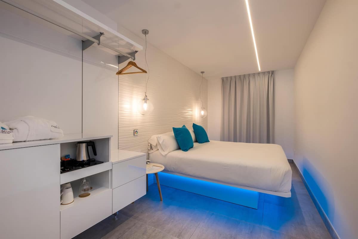 Junior Double Room, Terrace, Ground Floor | Minibar, in-room safe, blackout drapes, soundproofing