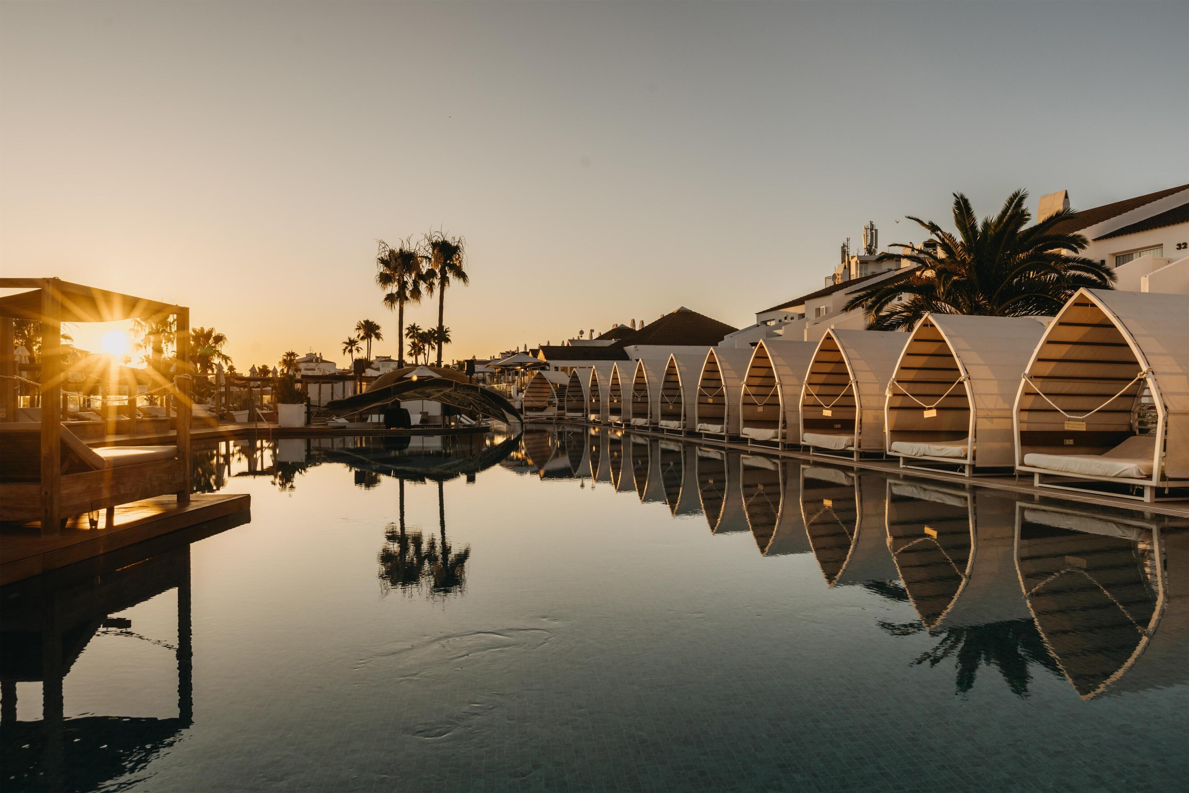 Outdoor pool, pool umbrellas, pool loungers