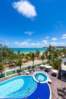 Outdoor pool, pool umbrellas, sun loungers