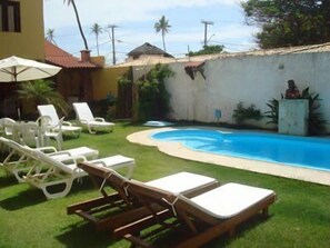 Outdoor pool, pool umbrellas, pool loungers