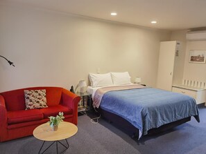 Down comforters, in-room safe, desk, blackout drapes
