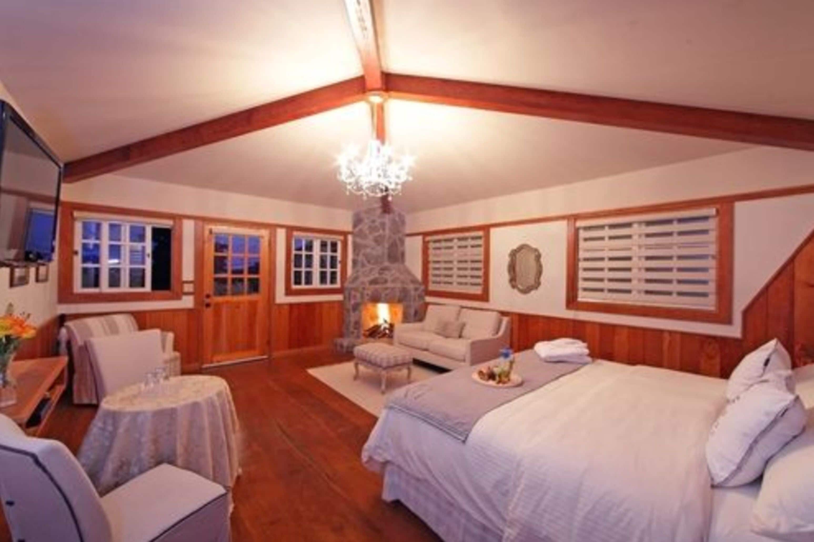 chimney suite - king | living area | 42-inch lcd tv with satellite channels, tv