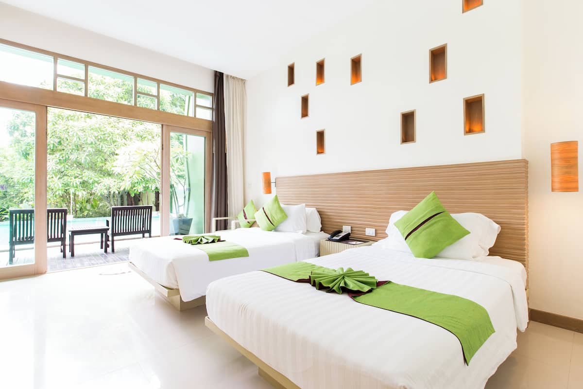 Deluxe Room, 2 Single Beds, Pool Access | In-room safe, individually furnished, desk, rollaway beds