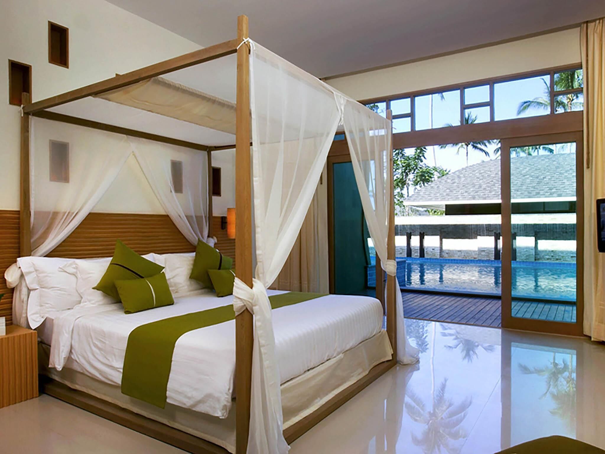 Deluxe Room, 1 King Bed, Pool Access | In-room safe, individually furnished, desk, rollaway beds