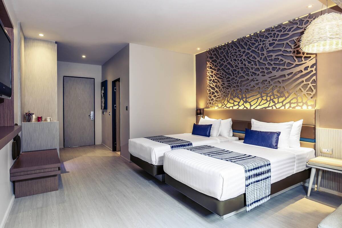 Standardværelse - 2 enkeltsenge | Pengeskab på værelset, individuel indretning, skrivebord