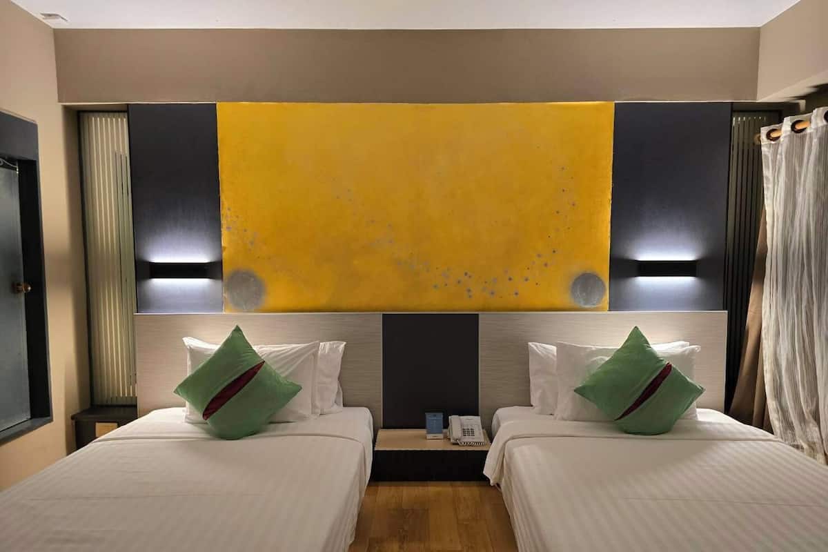 Deluxe Room, 2 Single Beds | In-room safe, individually furnished, desk, rollaway beds