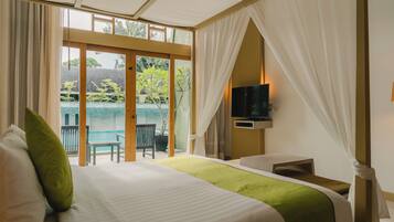 Deluxe Room, 1 King Bed, Pool Access | In-room safe, individually furnished, desk, rollaway beds