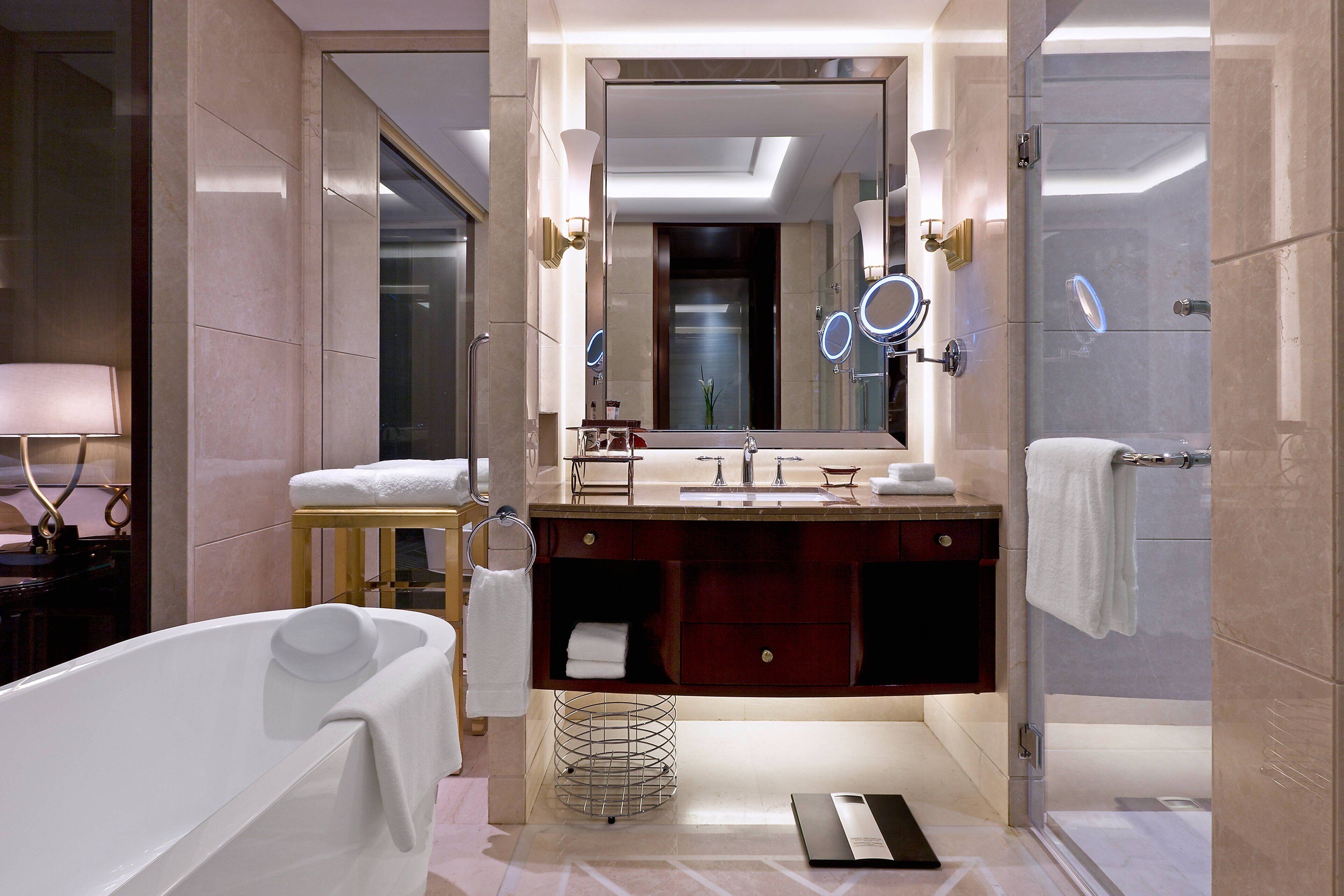 separate bathtub and shower, deep-soaking bathtub, rainfall showerhead