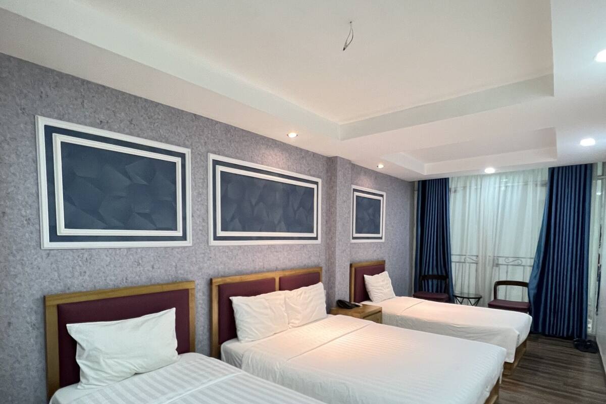 Family Quadruple Room | Minibar, WiFi (free), bed sheets