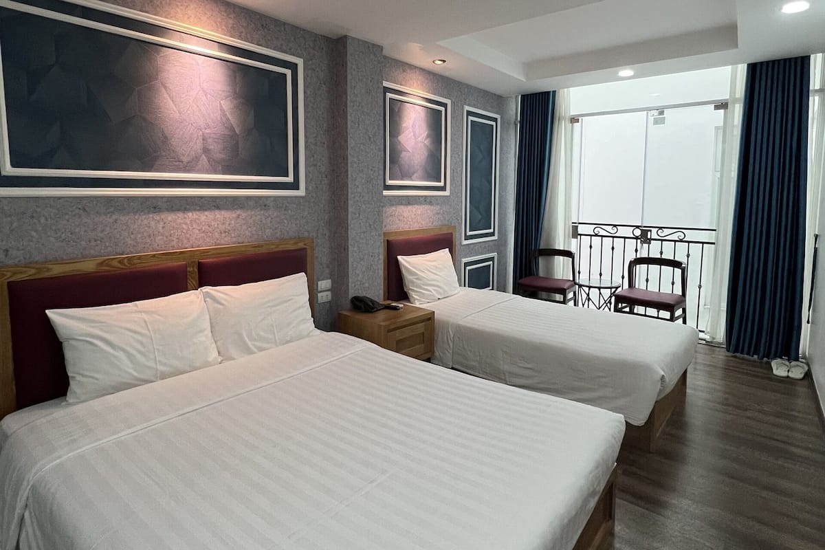 Family Triple Room | Minibar, WiFi (free), bed sheets