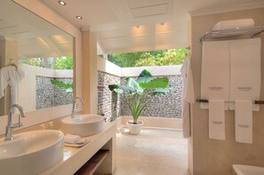 Shower, hair dryer, bathrobes, towels