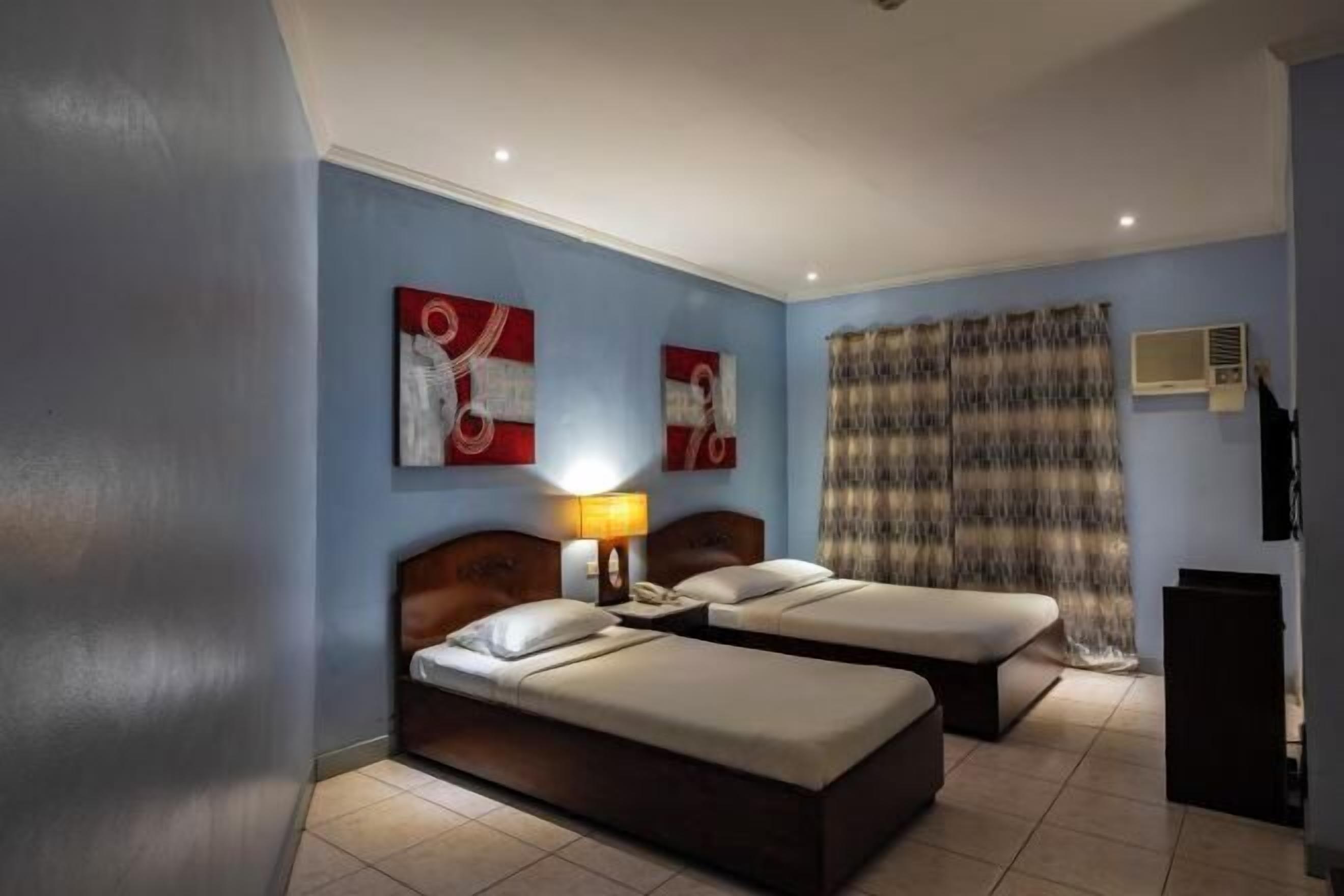 Roupas de cama premium, cofres nos quartos, individualmente mobiliados