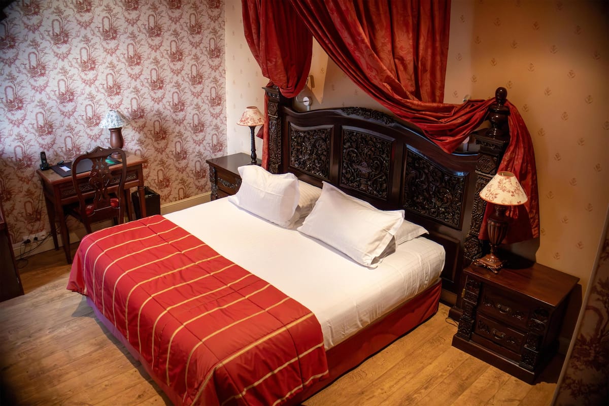 Standardzimmer, 1 King-Bett, Gartenblick | Zimmersafe, Schreibtisch, Verdunkelungsvorhänge, schallisolierte Zimmer