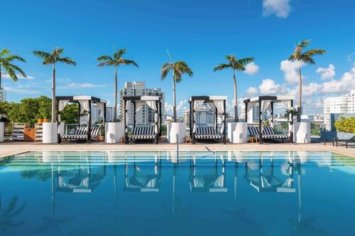 Outdoor pool, open 9:00 AM to 7:00 PM, pool cabanas (surcharge)