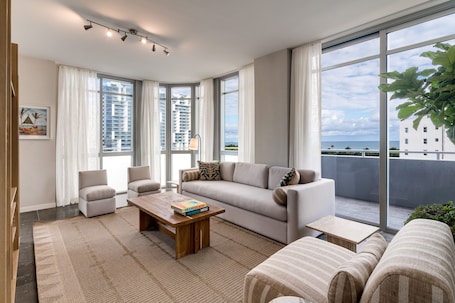 Three Bedroom Penthouse with Rooftop Terrace | Living area | 42-inch flat-screen TV with satellite channels, TV, iPod dock