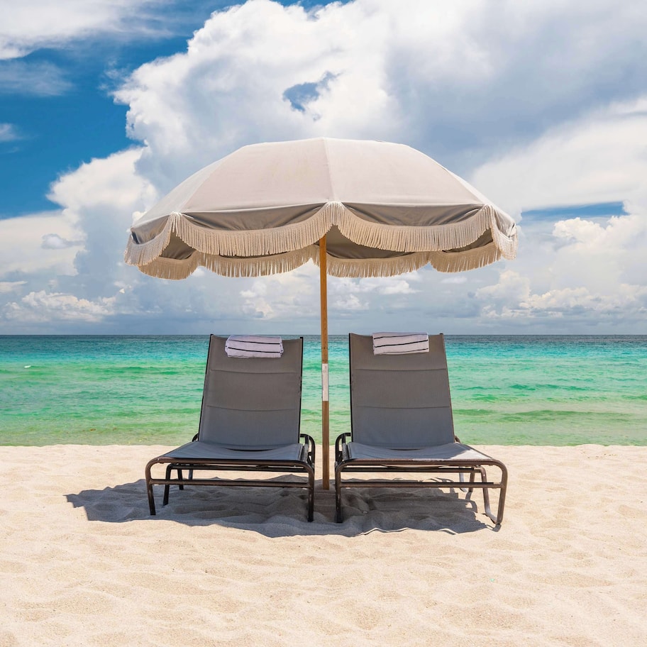 On the beach, beach cabanas, sun loungers, beach towels