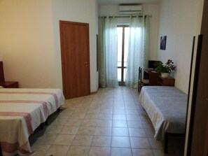 Desk, bed sheets, wheelchair access