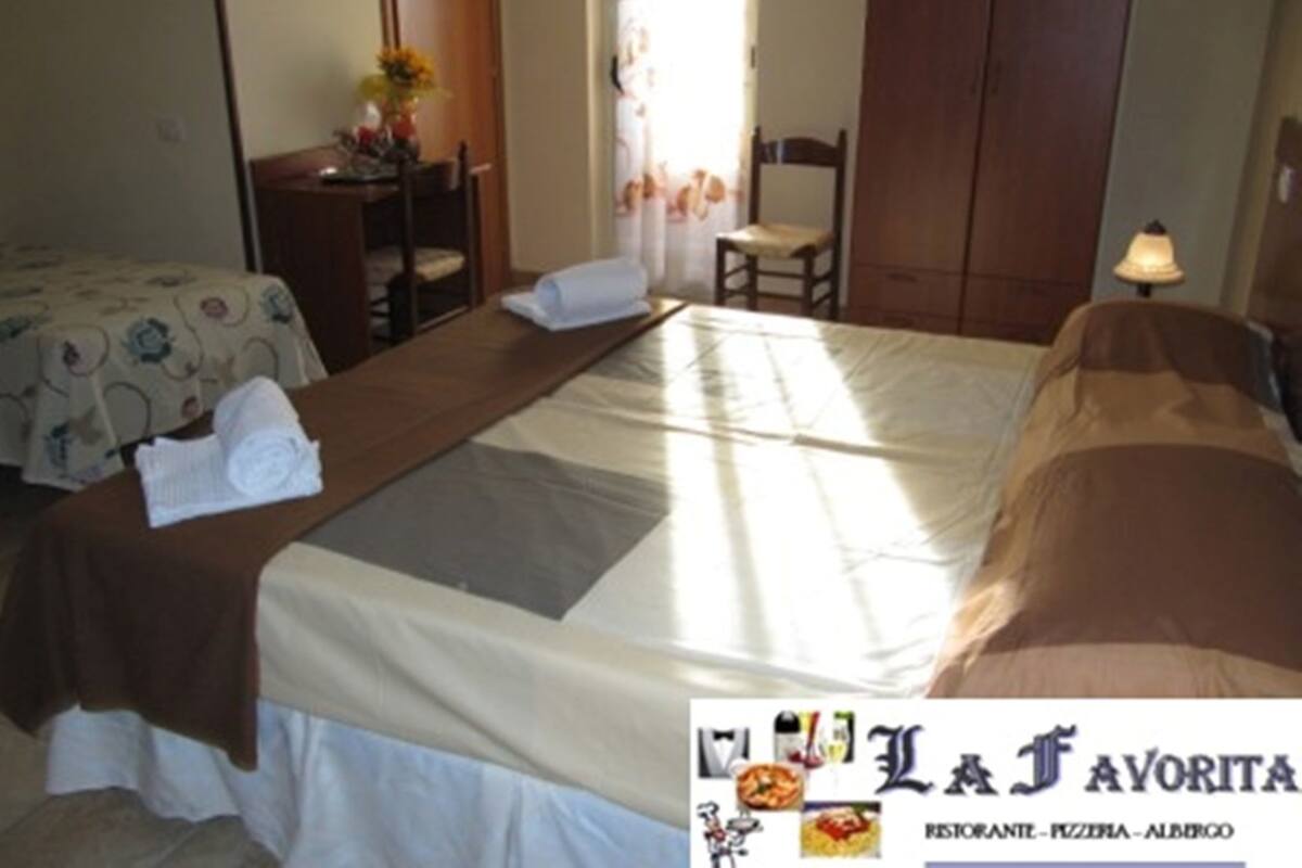 Desk, bed sheets, wheelchair access