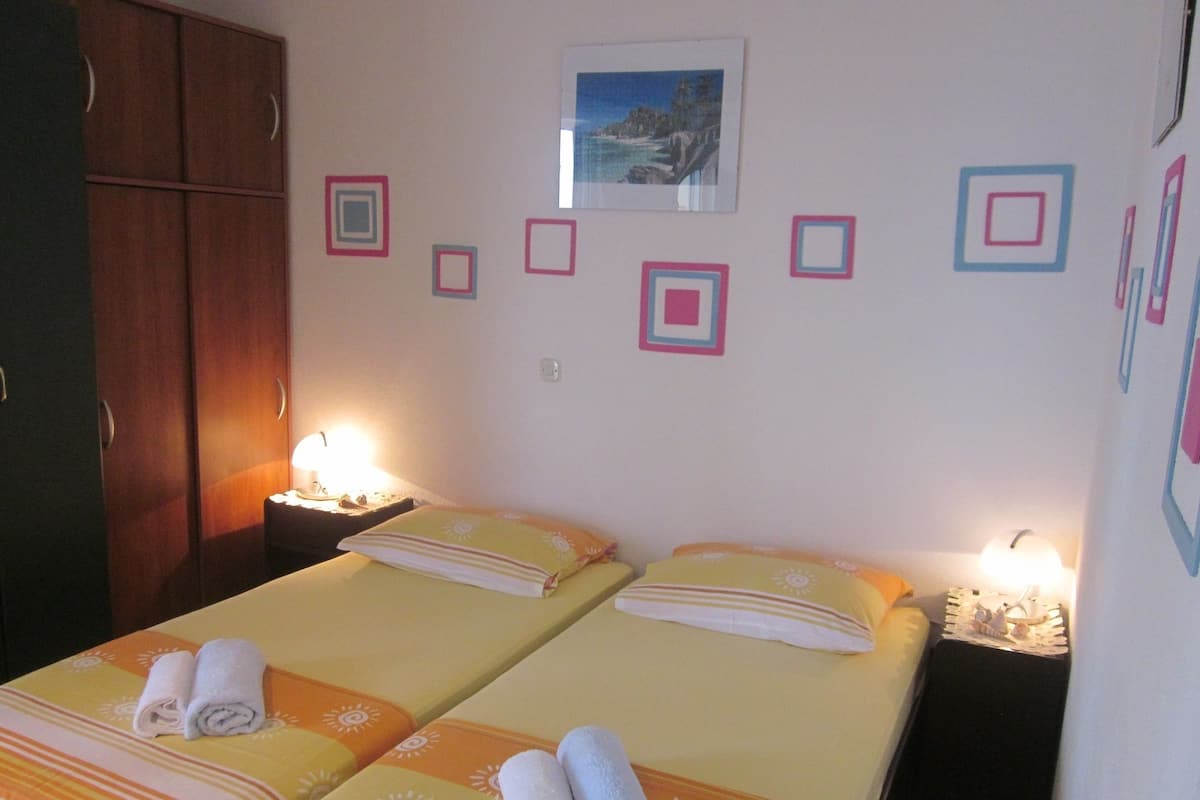 Standard Suite, Sea View | 1 bedroom, desk, blackout curtains, iron/ironing board