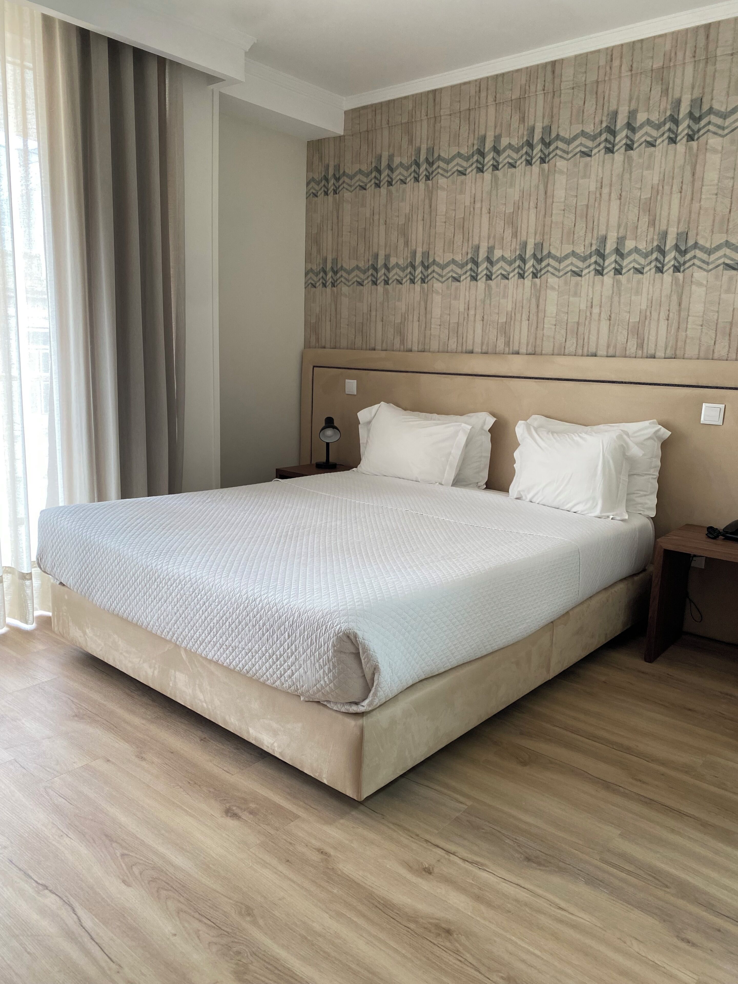 Superior Double Room | Minibar, in-room safe, desk, blackout drapes