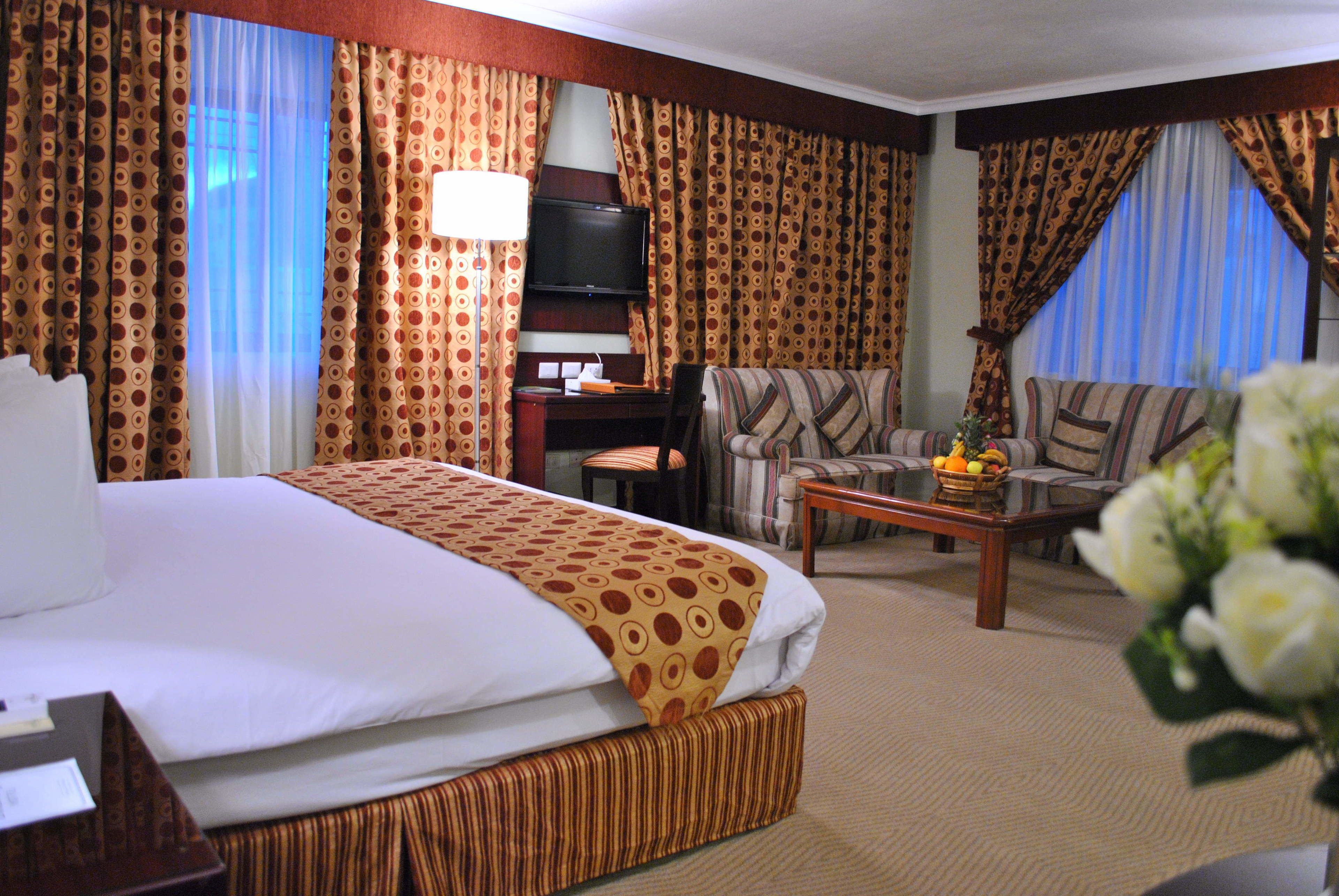 junior suite | pillow-top beds, minibar, in-room safe, desk