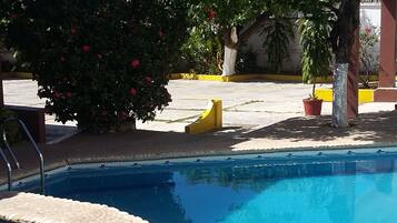 Outdoor pool, open 10 AM to 9 PM, sun loungers