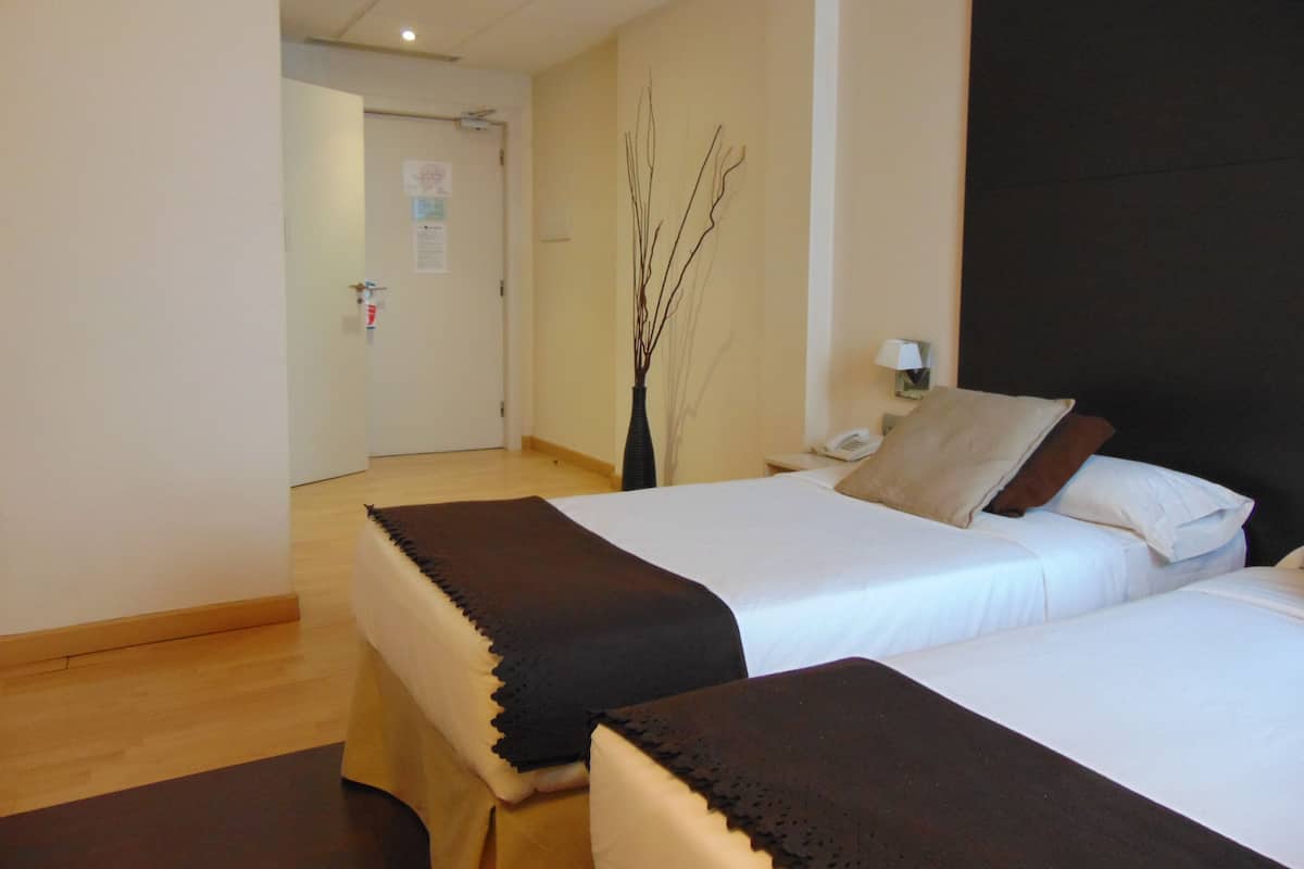Desk, iron/ironing board (on request), WiFi (free), bed sheets