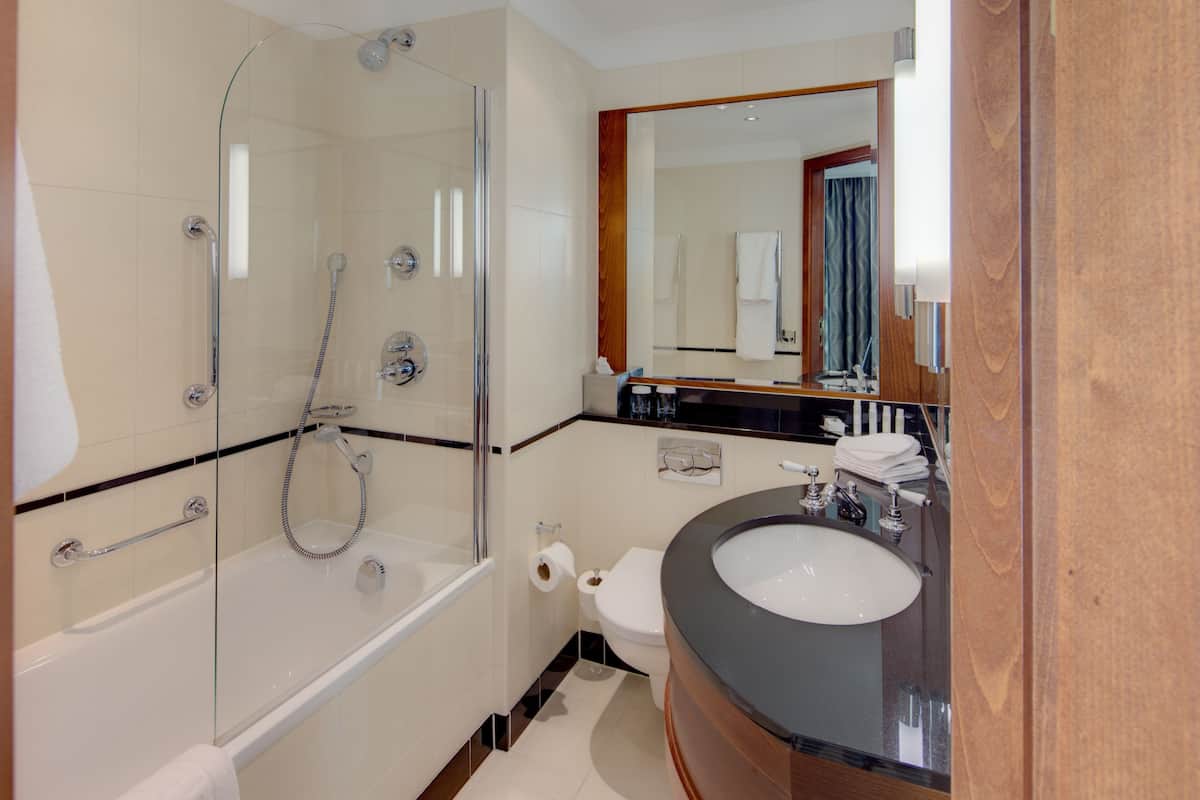 room, 1 queen bed | bathroom | free toiletries, hair dryer, towels, shampoo