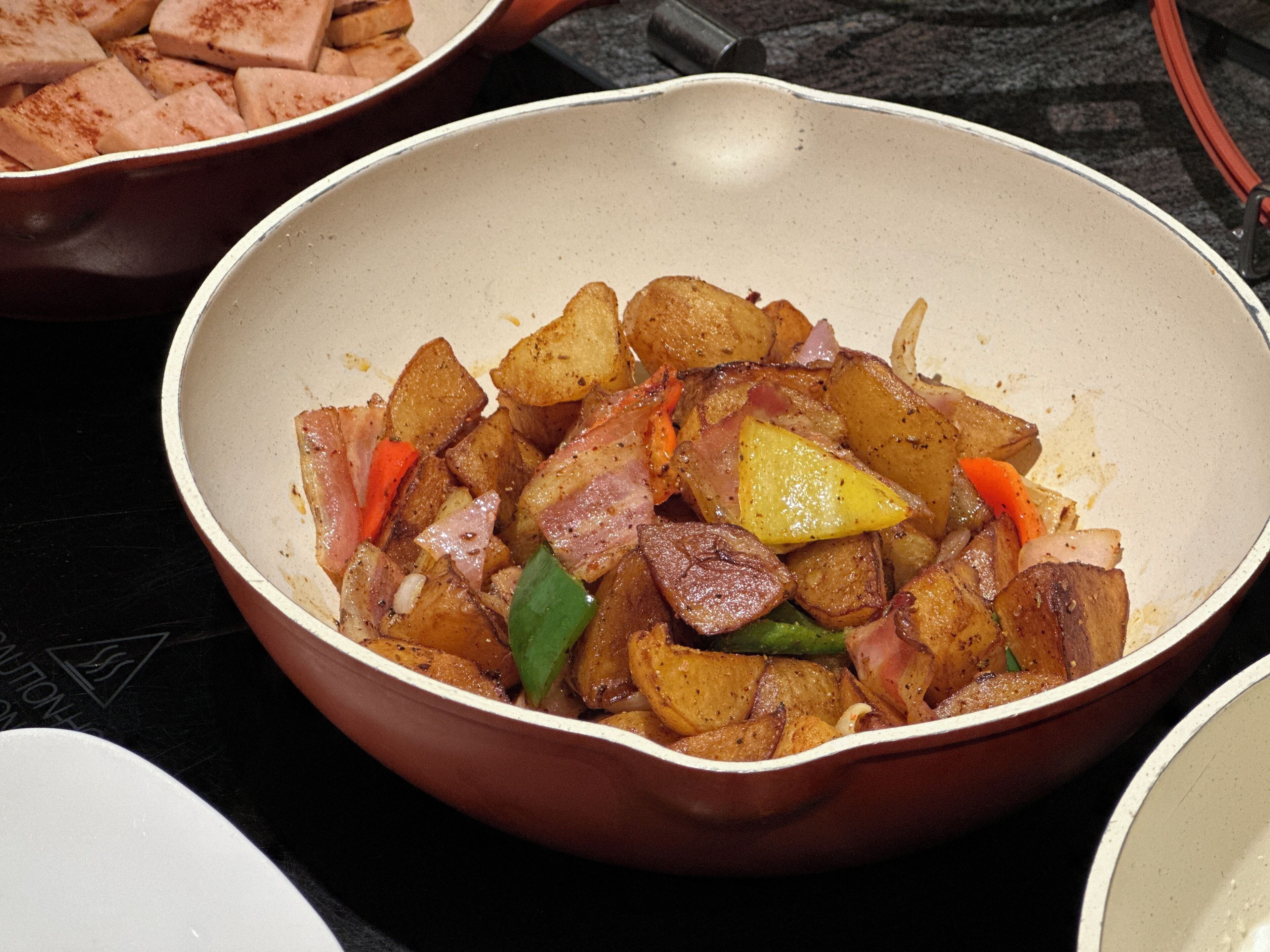A bowl of food with various ingredients.