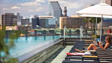 Seasonal outdoor pool, pool cabanas (surcharge), pool umbrellas