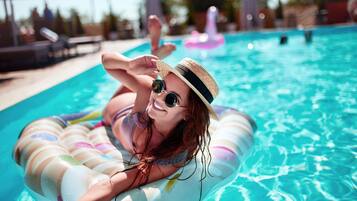 Outdoor pool, pool cabanas (surcharge), pool umbrellas