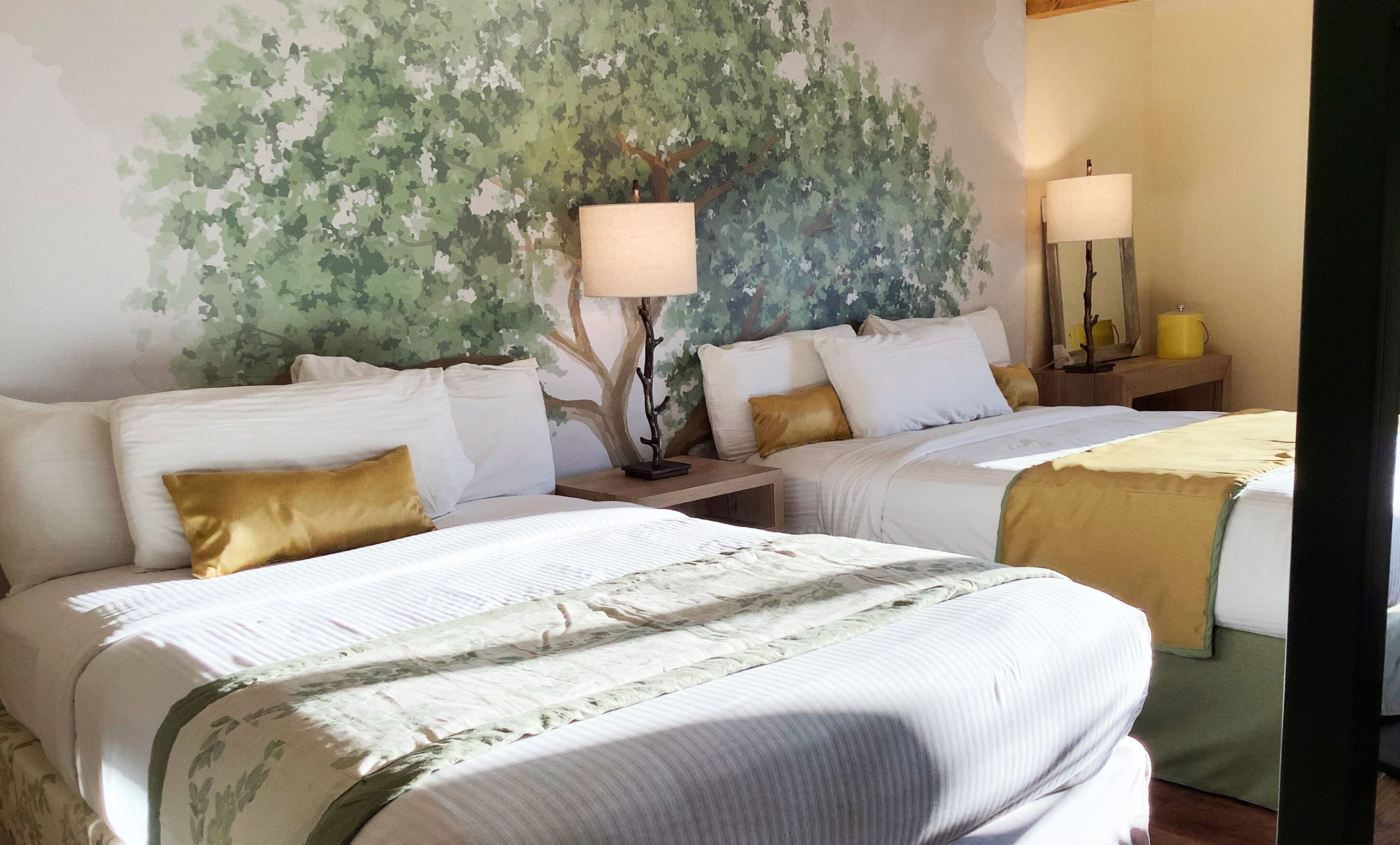 Luxury Two Queens Balcony Parkway View | Premium bedding, down comforters, pillowtop beds, individually decorated