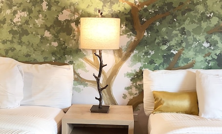 Premium bedding, down comforters, pillowtop beds, individually decorated